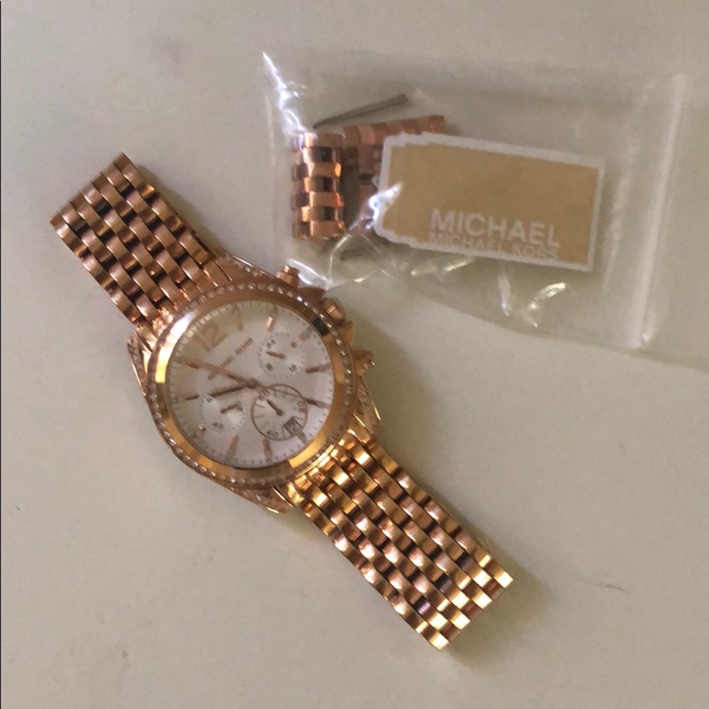 Rose gold watch with extra links